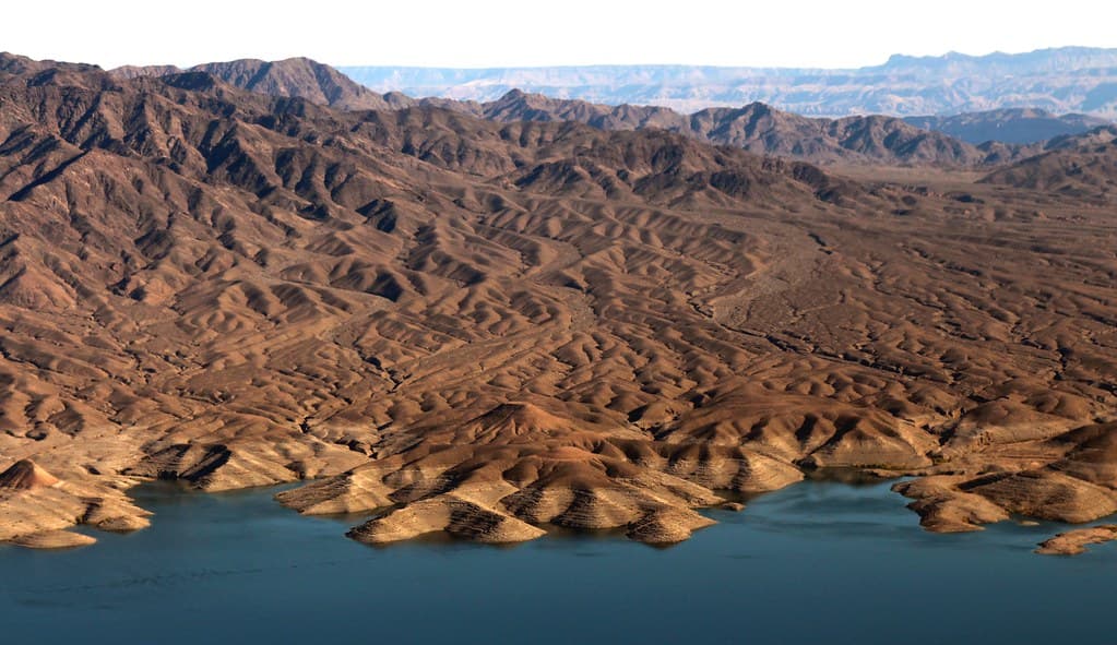 Lake Mead hits record lows, threatening water and power supplies