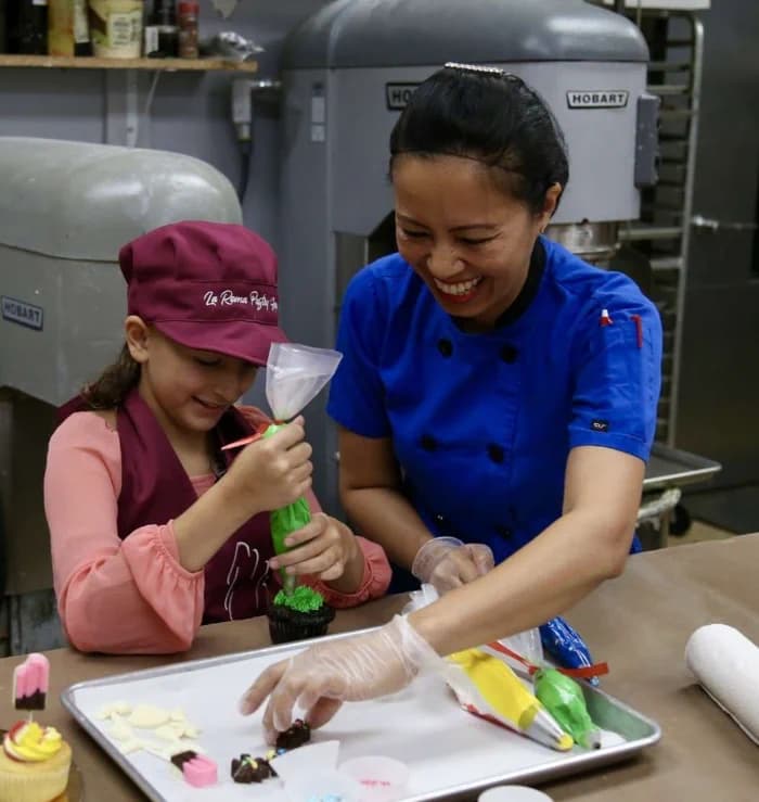 Suffolk police surprise 11-year-old cancer survivor with bakery day