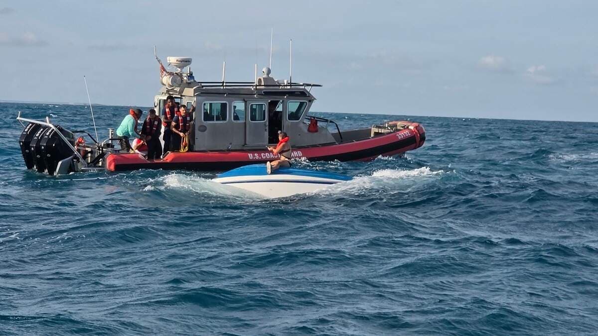 Coast Guard rescues three from overturned boat off the Keys