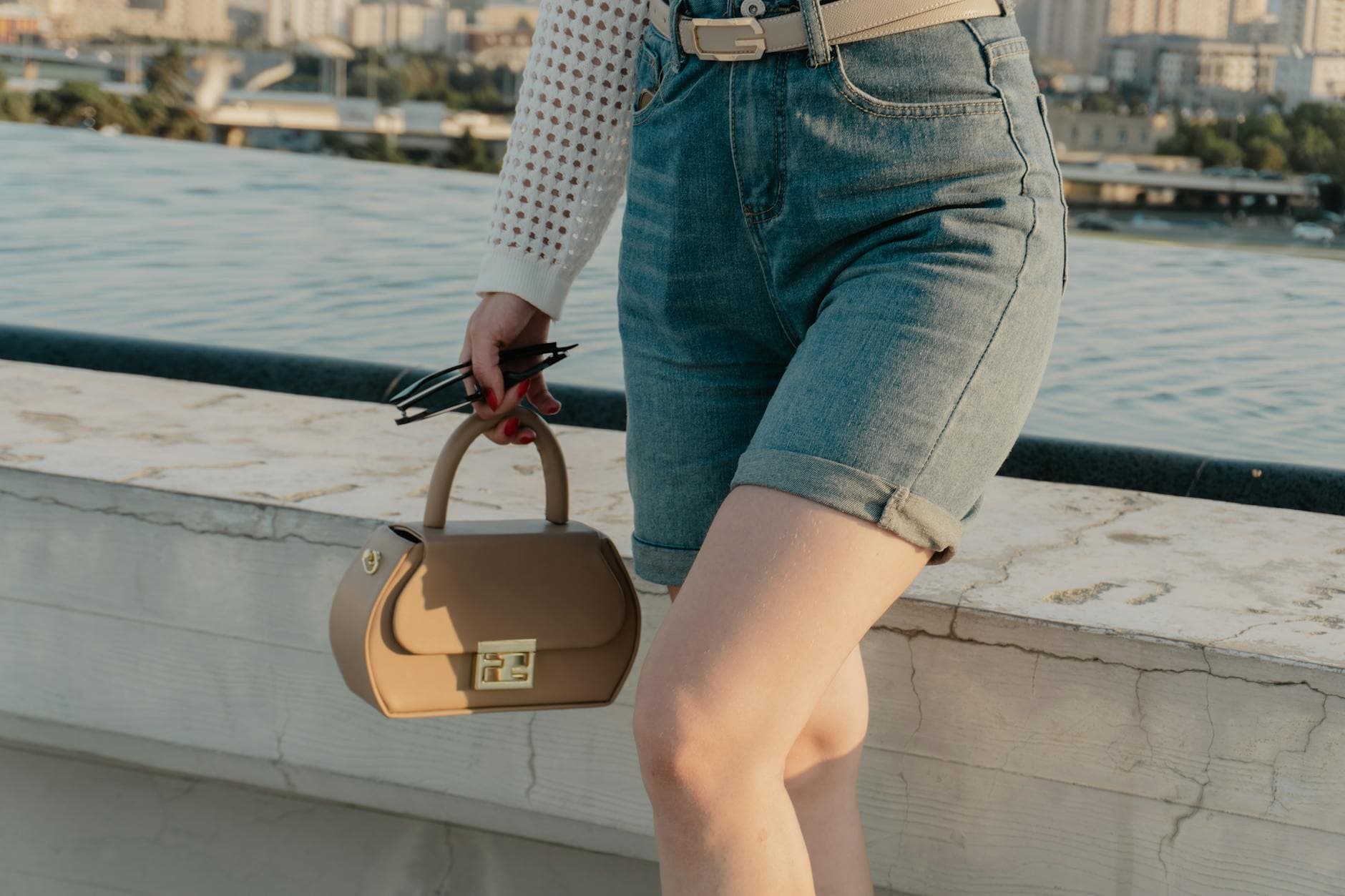 Sadie Sink makes long denim Bermuda shorts work for petite frames