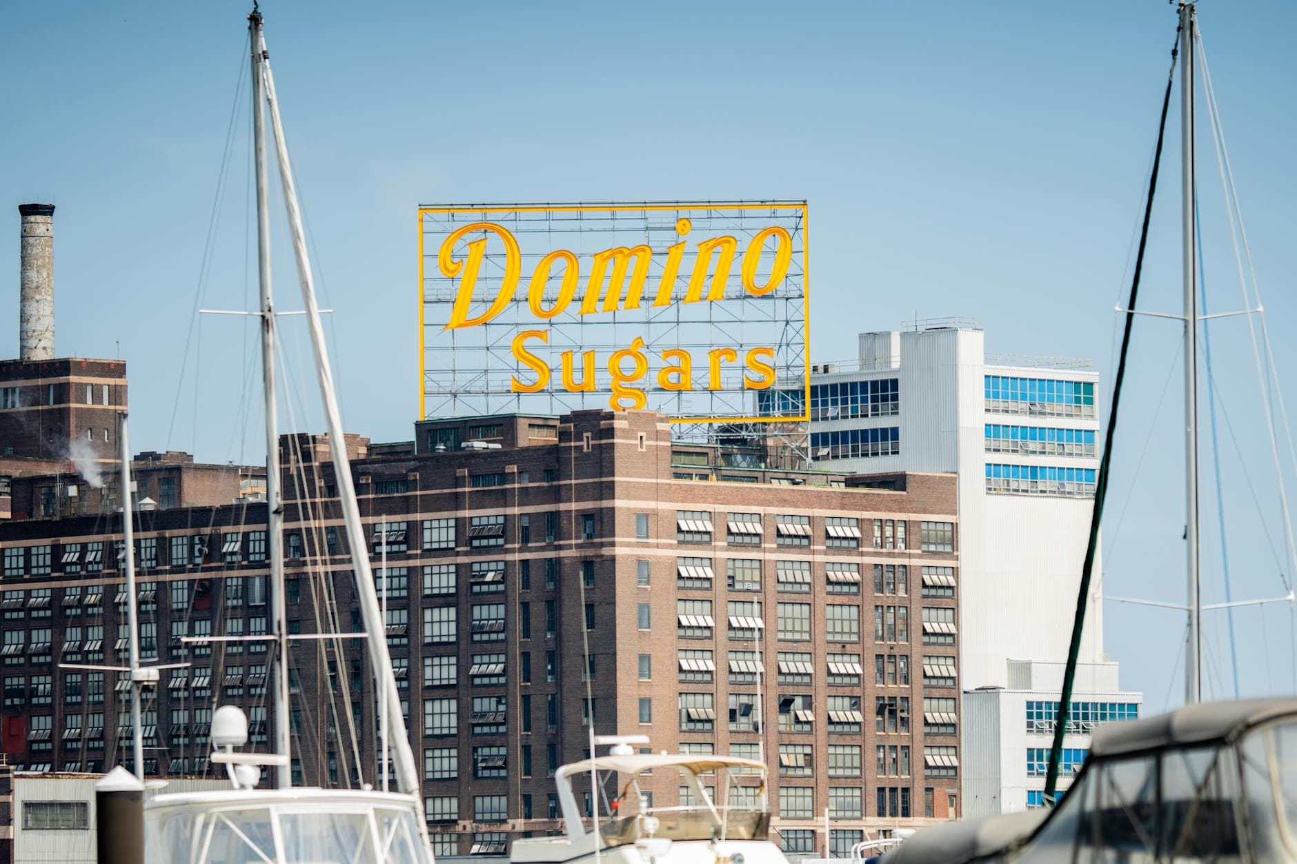 Domino Sugars sign lights Baltimore skyline for 75 years