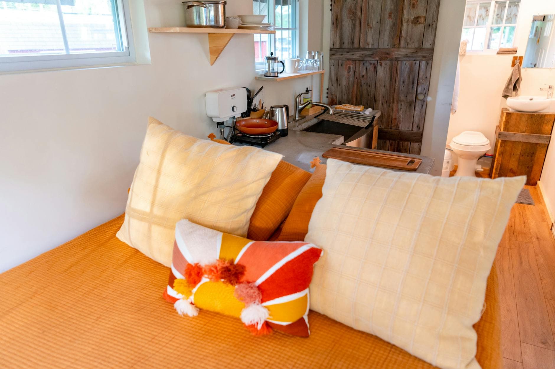 Cinnamon Bear tiny house blends rustic charm with practical comfort