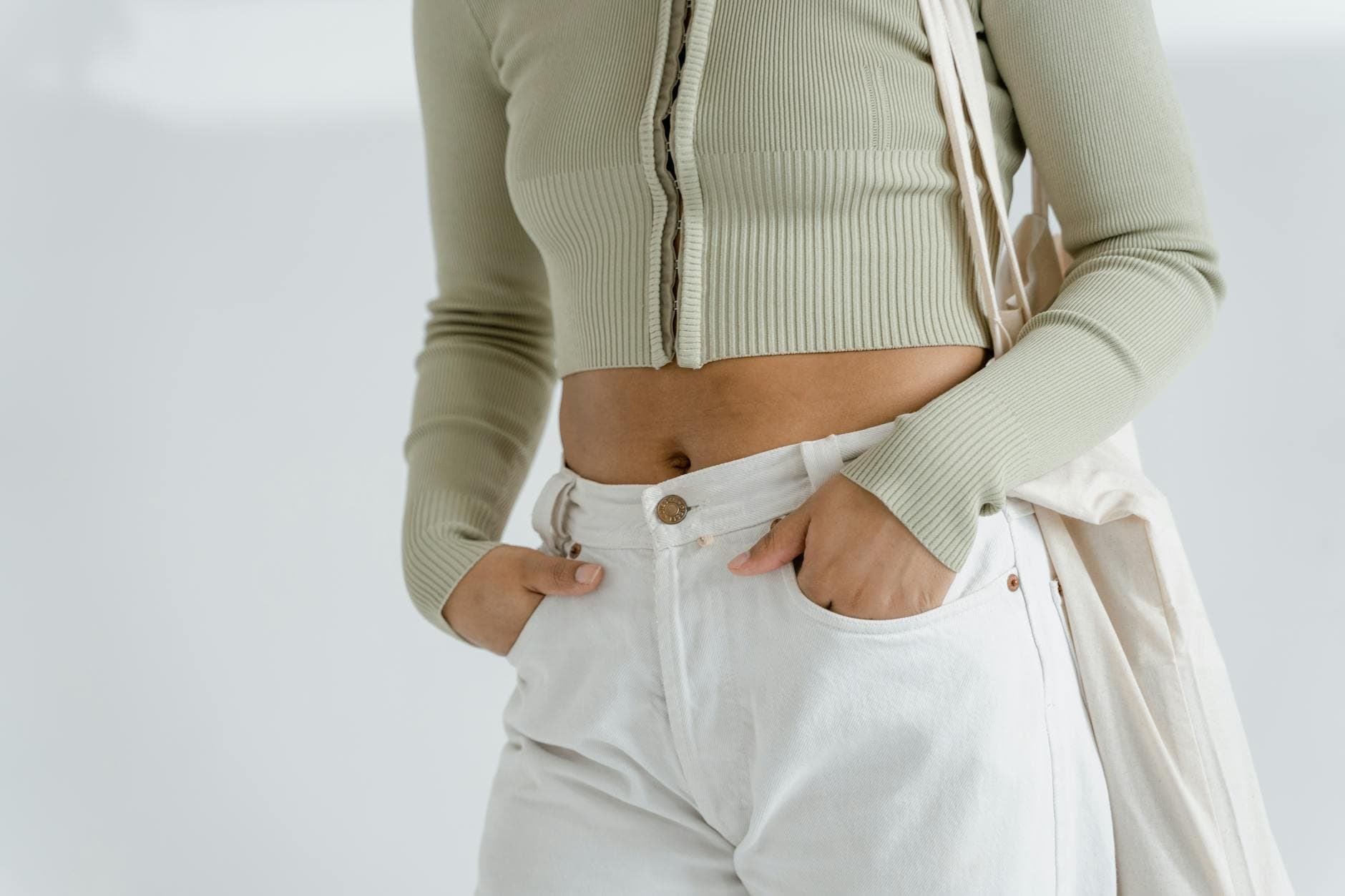 Rihanna makes white jeans feel fresh with tonal minimalist layers