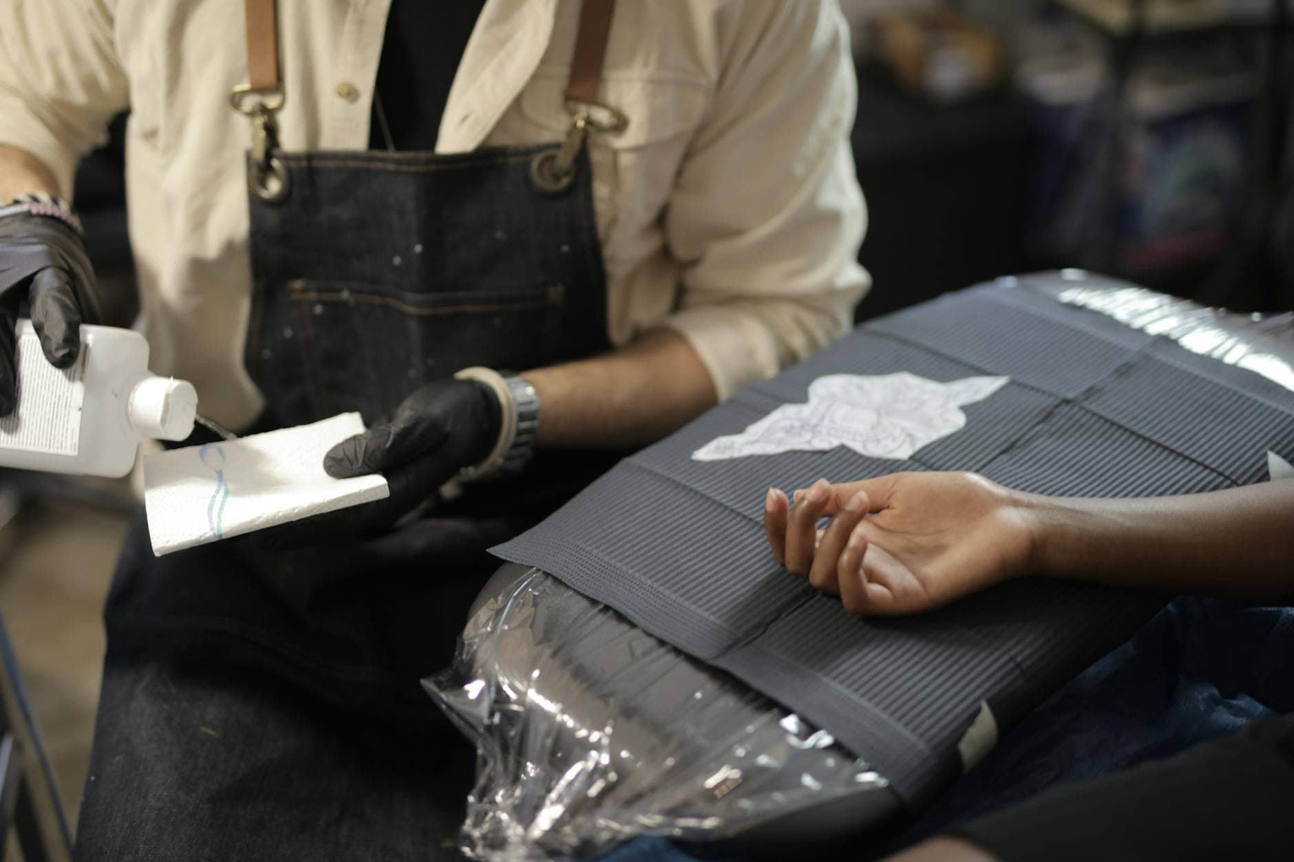 tattoo studio hygiene rules, OSHA standards and disinfectant requirements