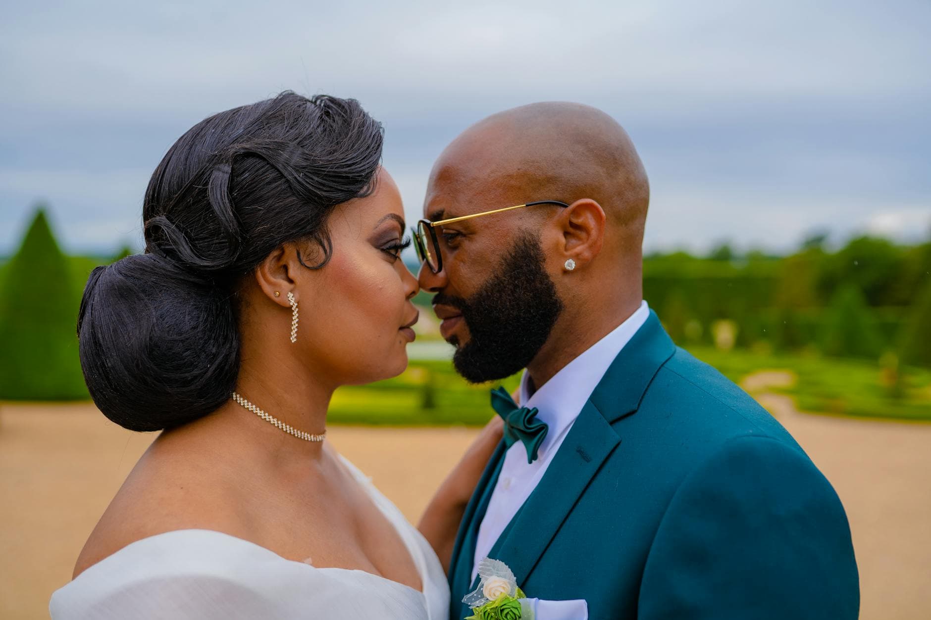 Parisian garden wedding spotlights a custom ceremony gown and glam second look