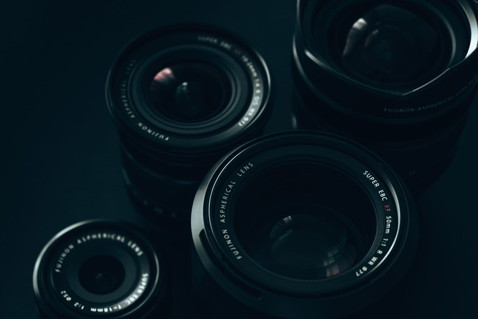 What is longitudinal chromatic aberration, and why is it so hard to correct