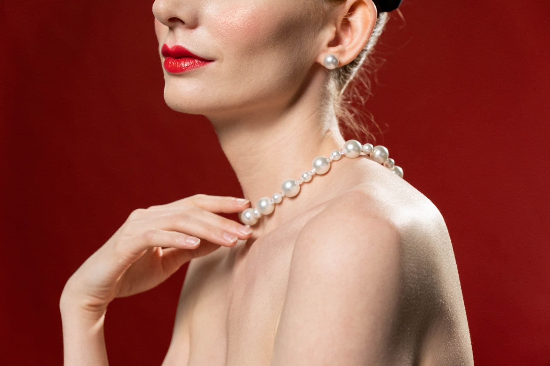 June birthstone necklace puts pearls on a modern red cord
