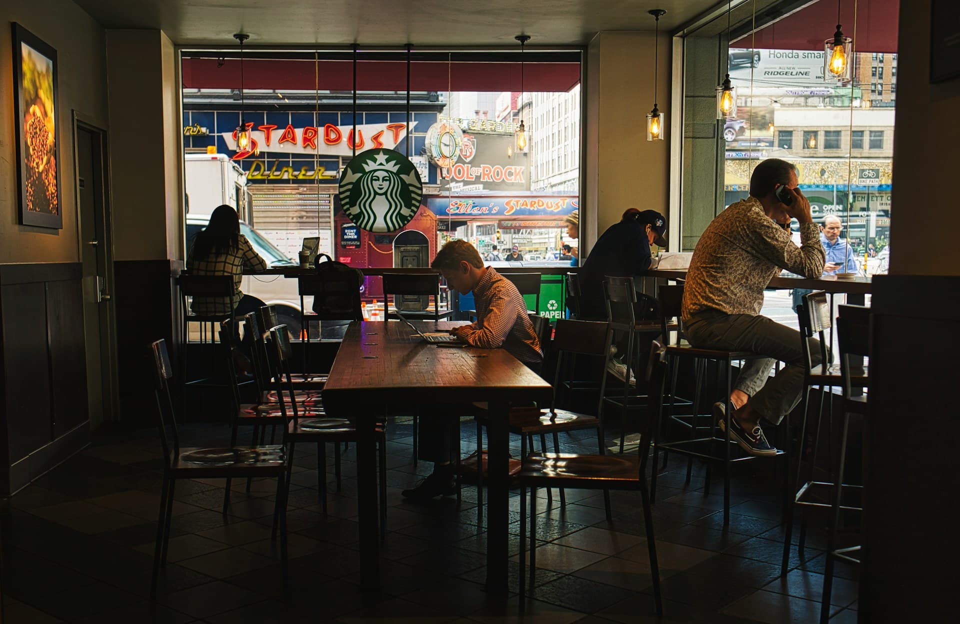 Starbucks leans into cafe linger strategy as store work shifts