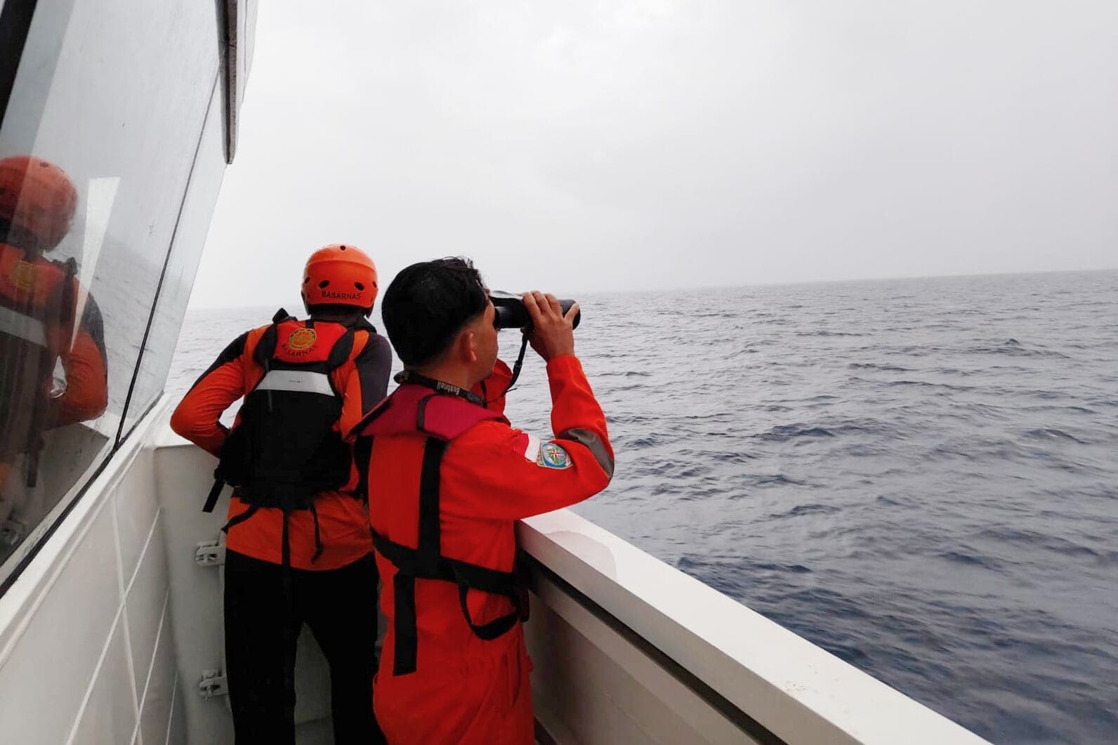 Mother and son rescued after passenger boat sinks in Indonesia