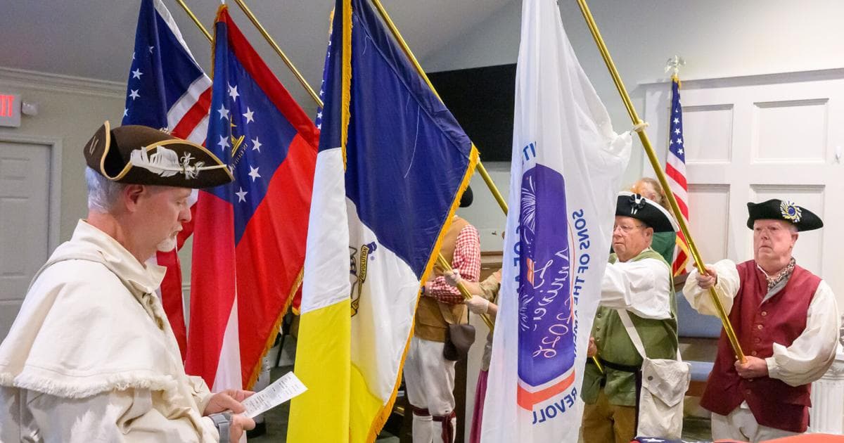 Cumming ceremony honors Flag Day with respectful flag retirement