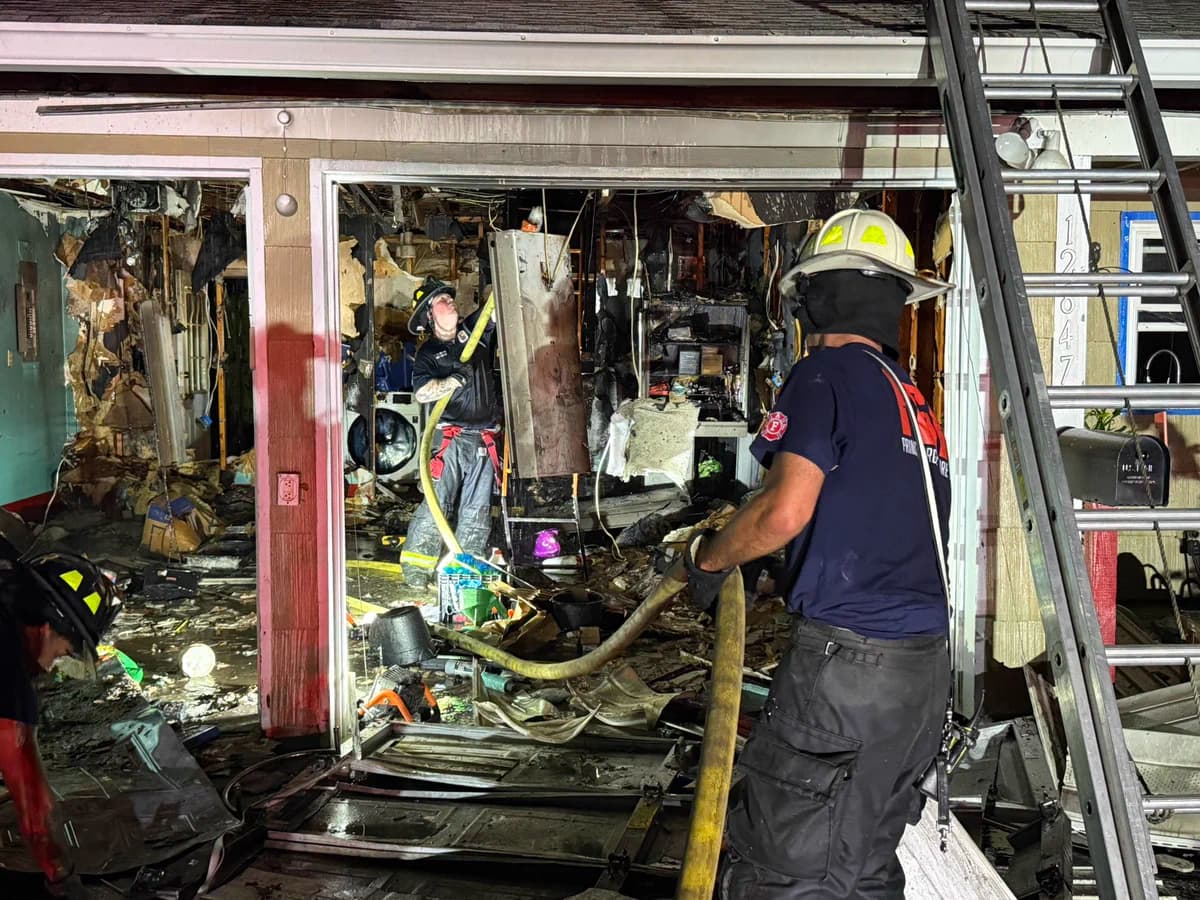 Firefighters contain Bowie house fire with no injuries, cause under investigation