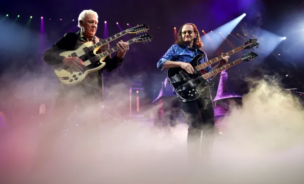 Rush returns with new drummer, honors Neil Peart at United Center