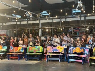 Young artists unveil 20 new benches in Lawrence community celebration