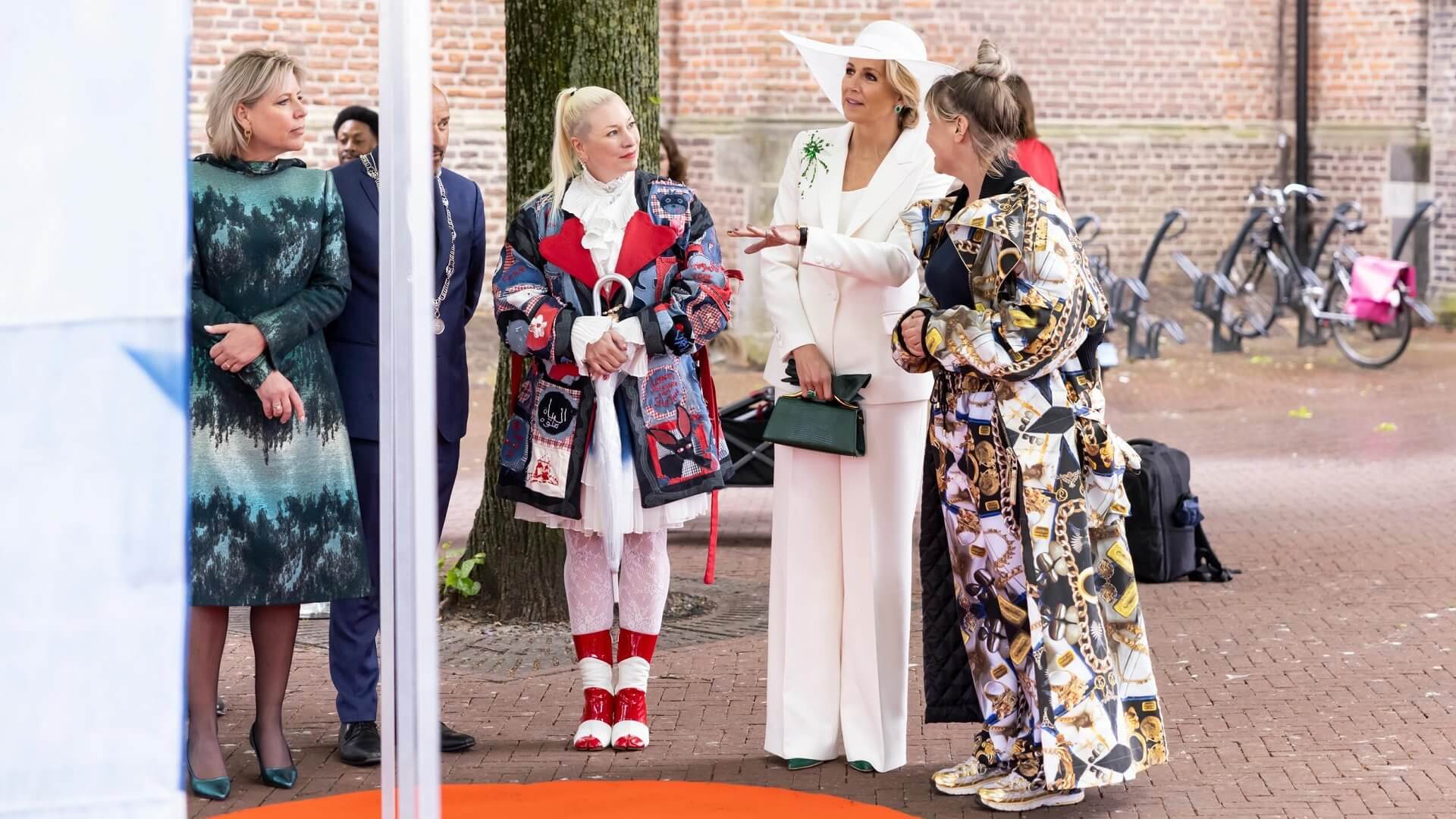 Queen Máxima's bridal-white suit offers a modern wedding alternative