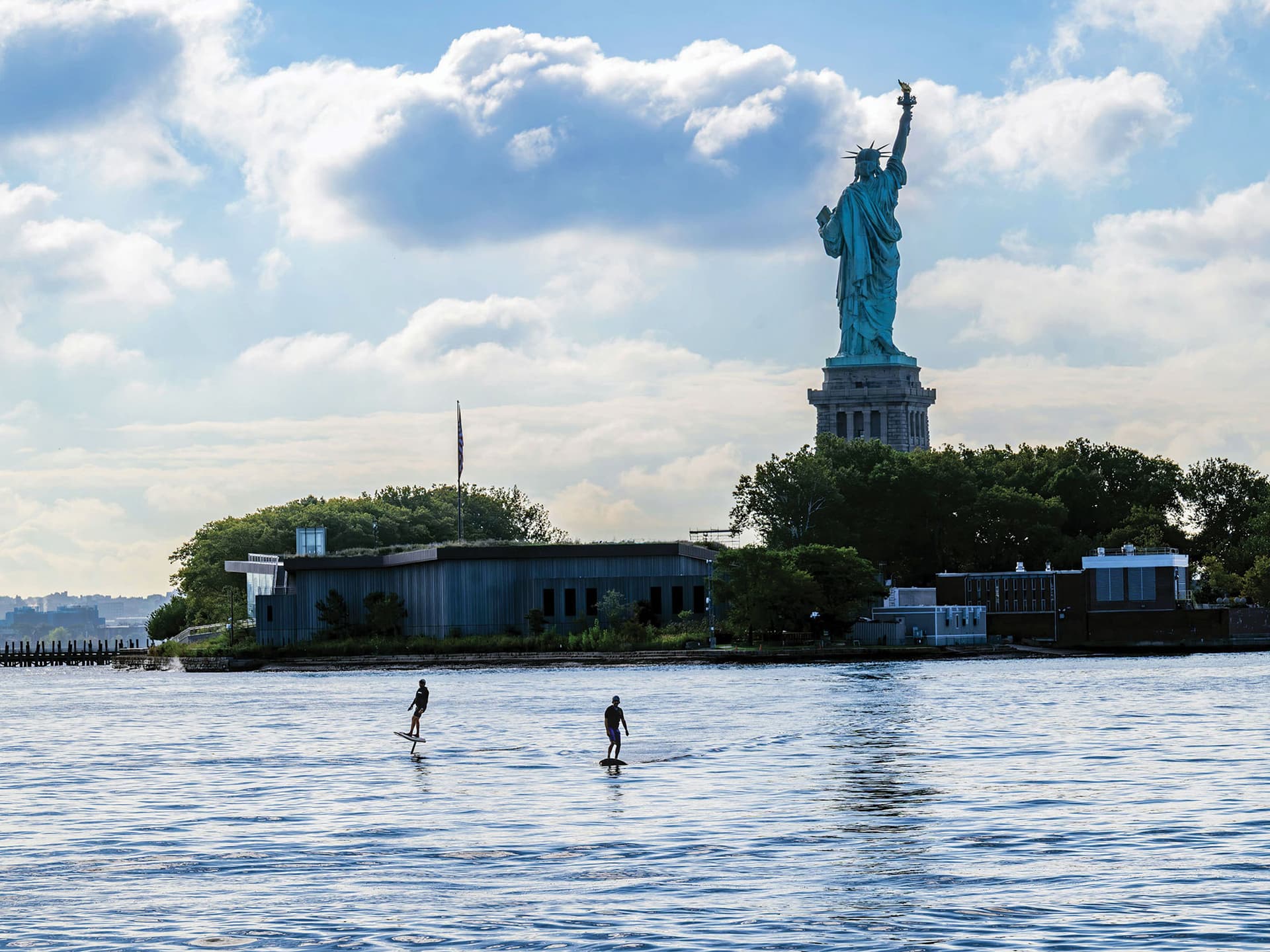Fliteboard ride circles the Statue of Liberty in New York Harbor