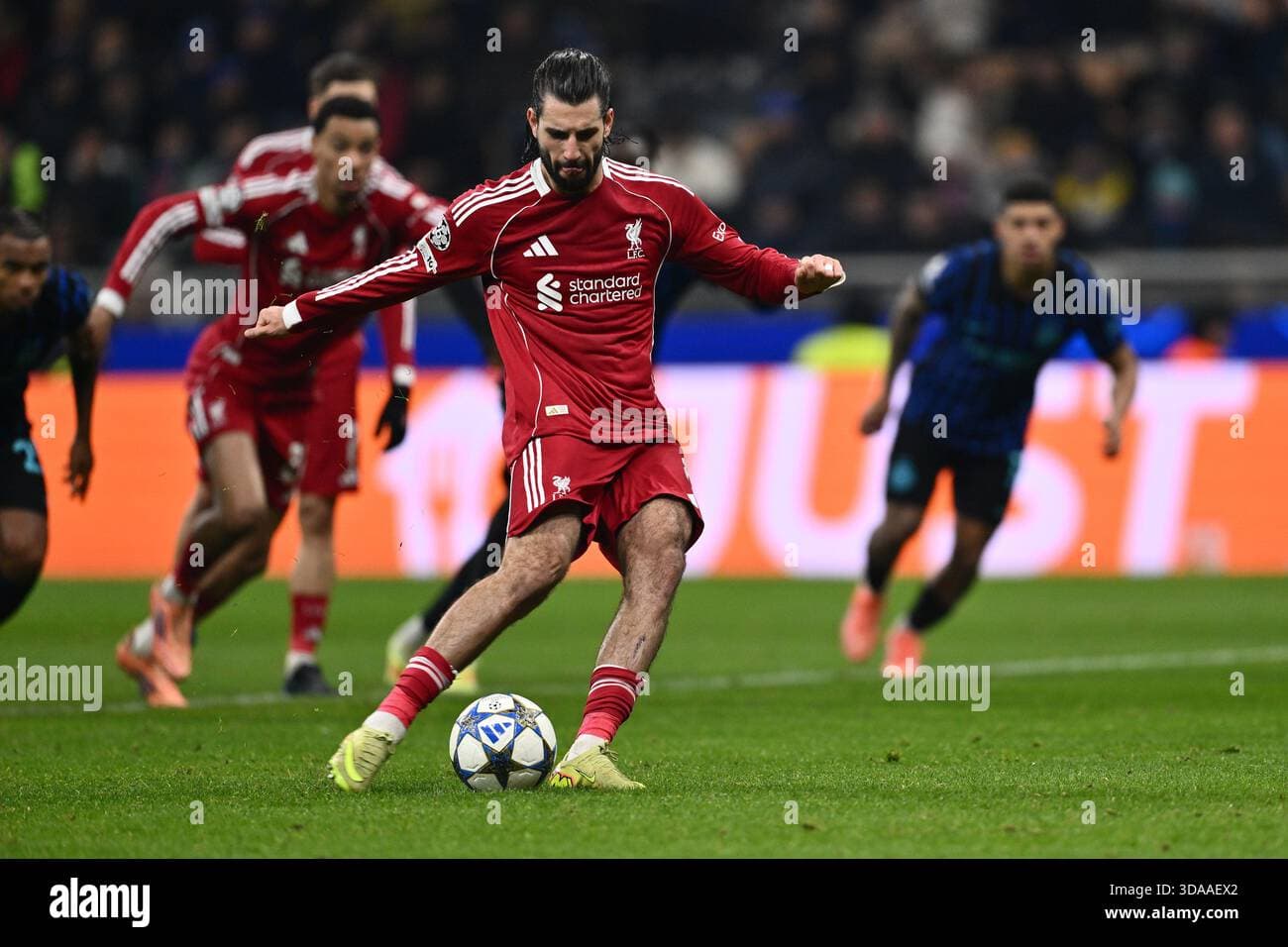 Szoboszlai’s late penalty sends Salahless Liverpool past Inter Milan