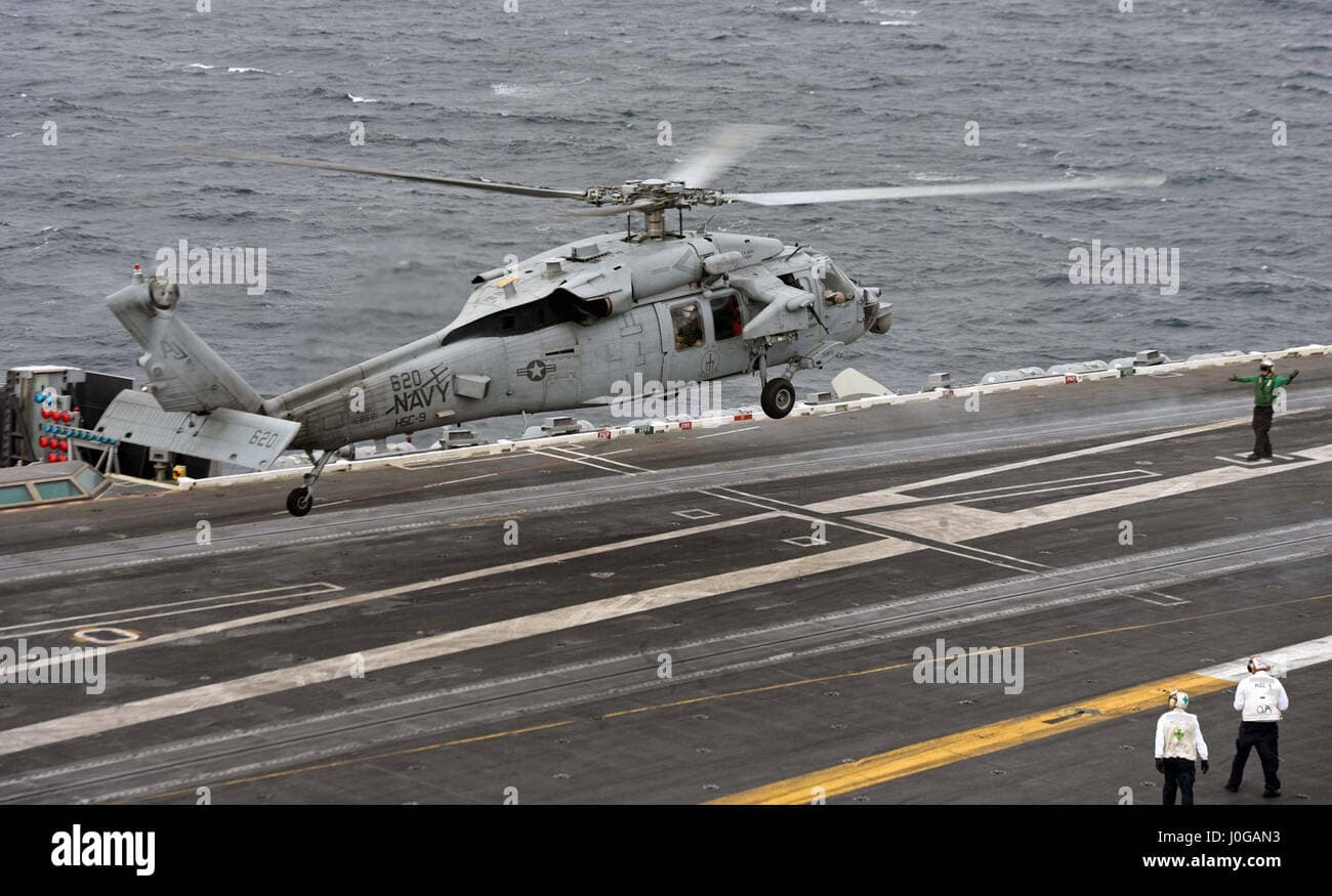 U.S. Navy suspends search for missing sailor after helicopter crash