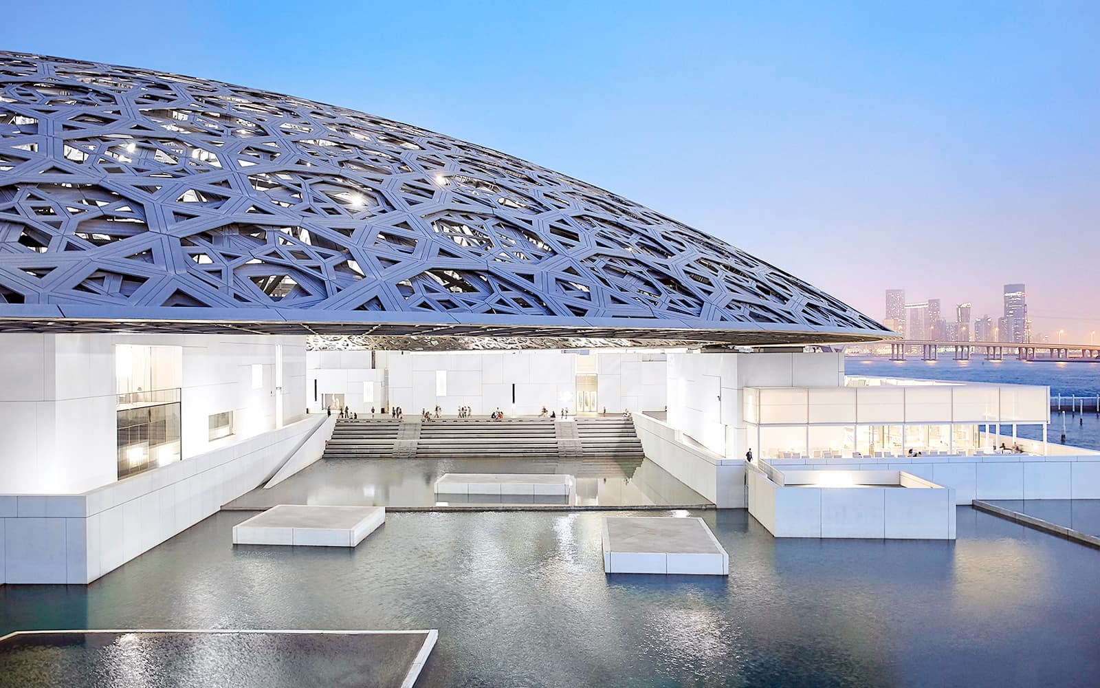 Louvre Abu Dhabi and Dellaluna unveil a dome-inspired bag