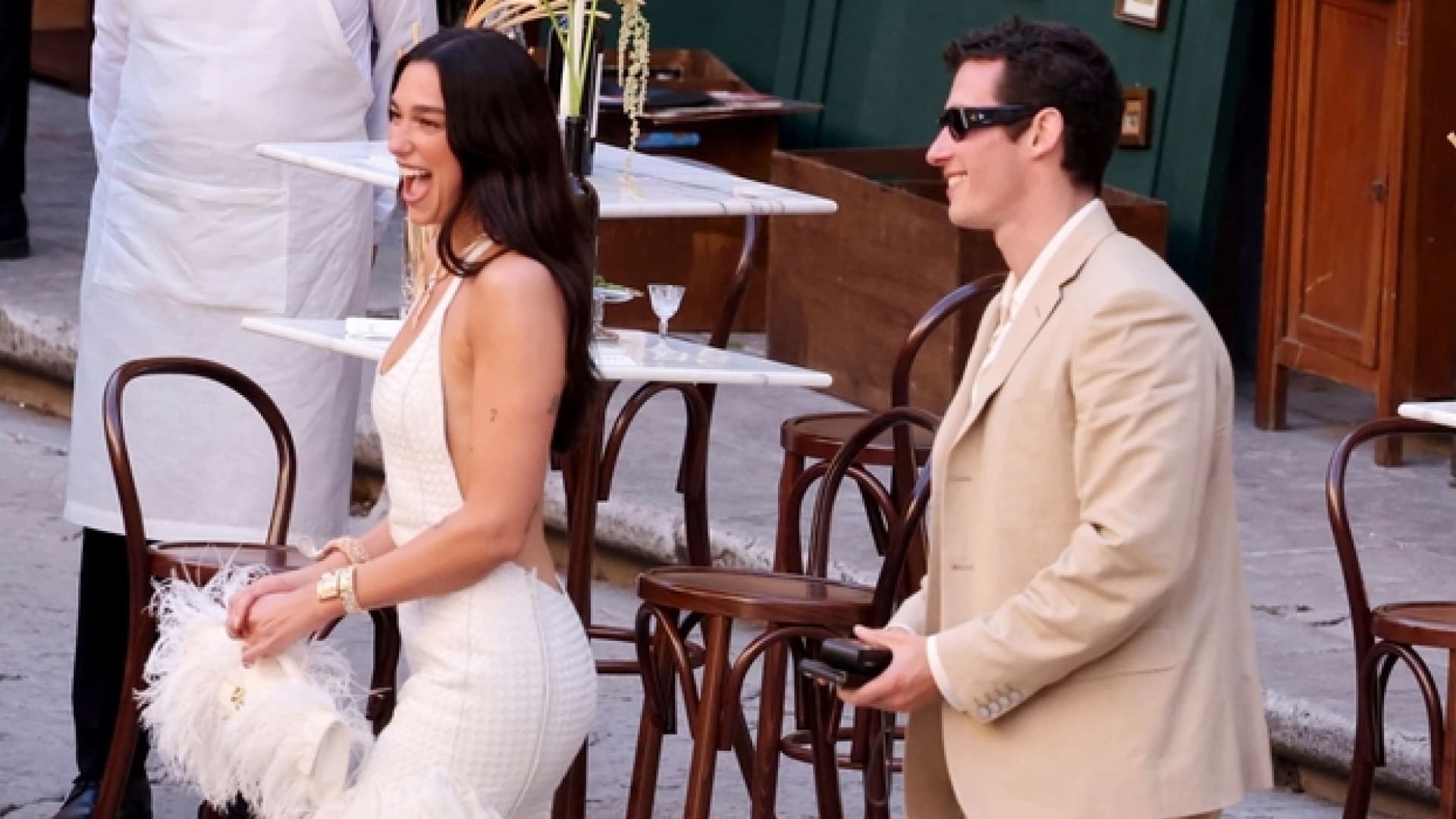 Dua Lipa wears custom Bottega Veneta wedding-party dress in Sicily