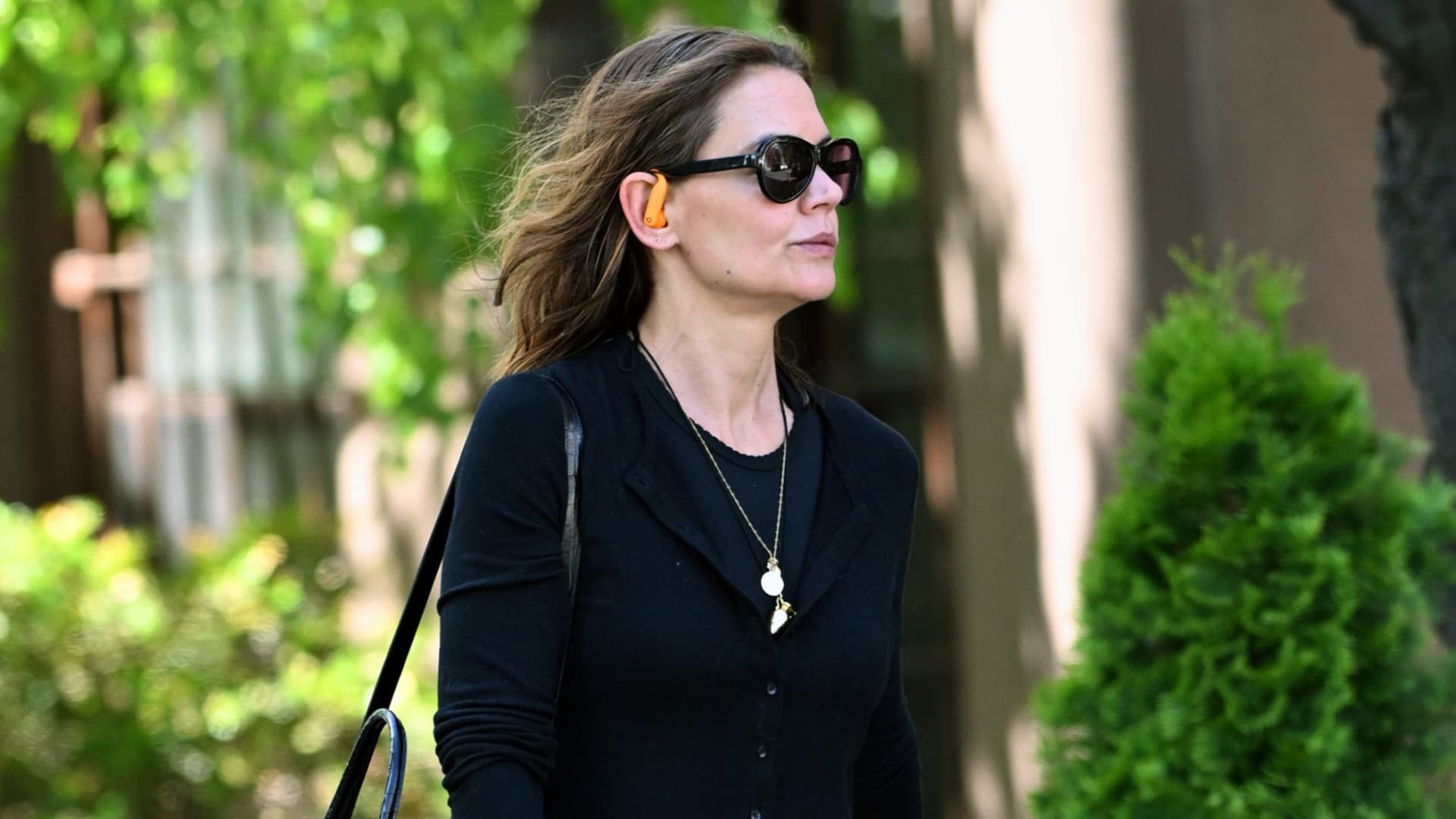 Katie Holmes revives '90s cord necklaces as gold pendants return