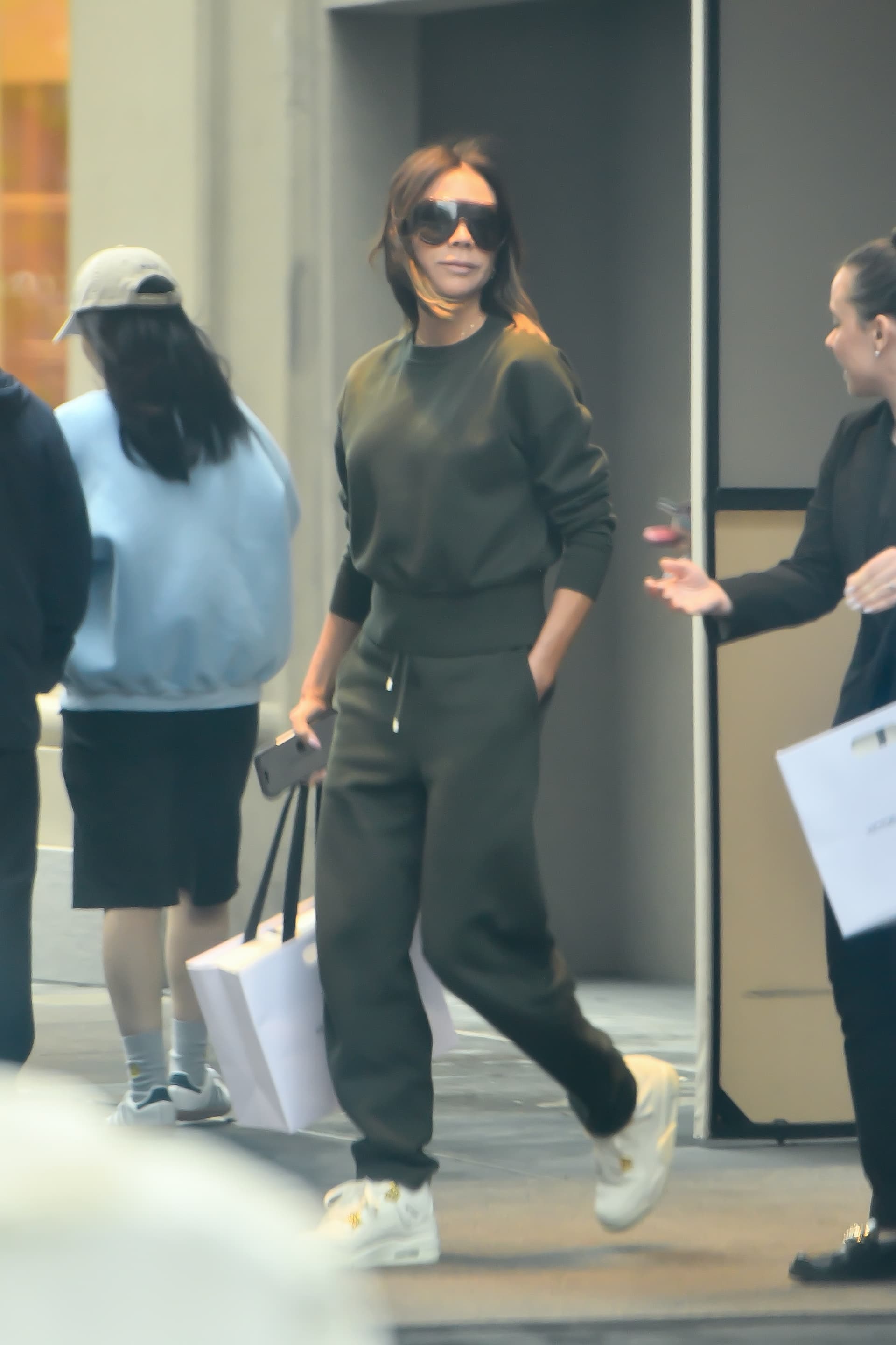 Victoria Beckham's sporty sneakers prove petite outfits can stay sharp