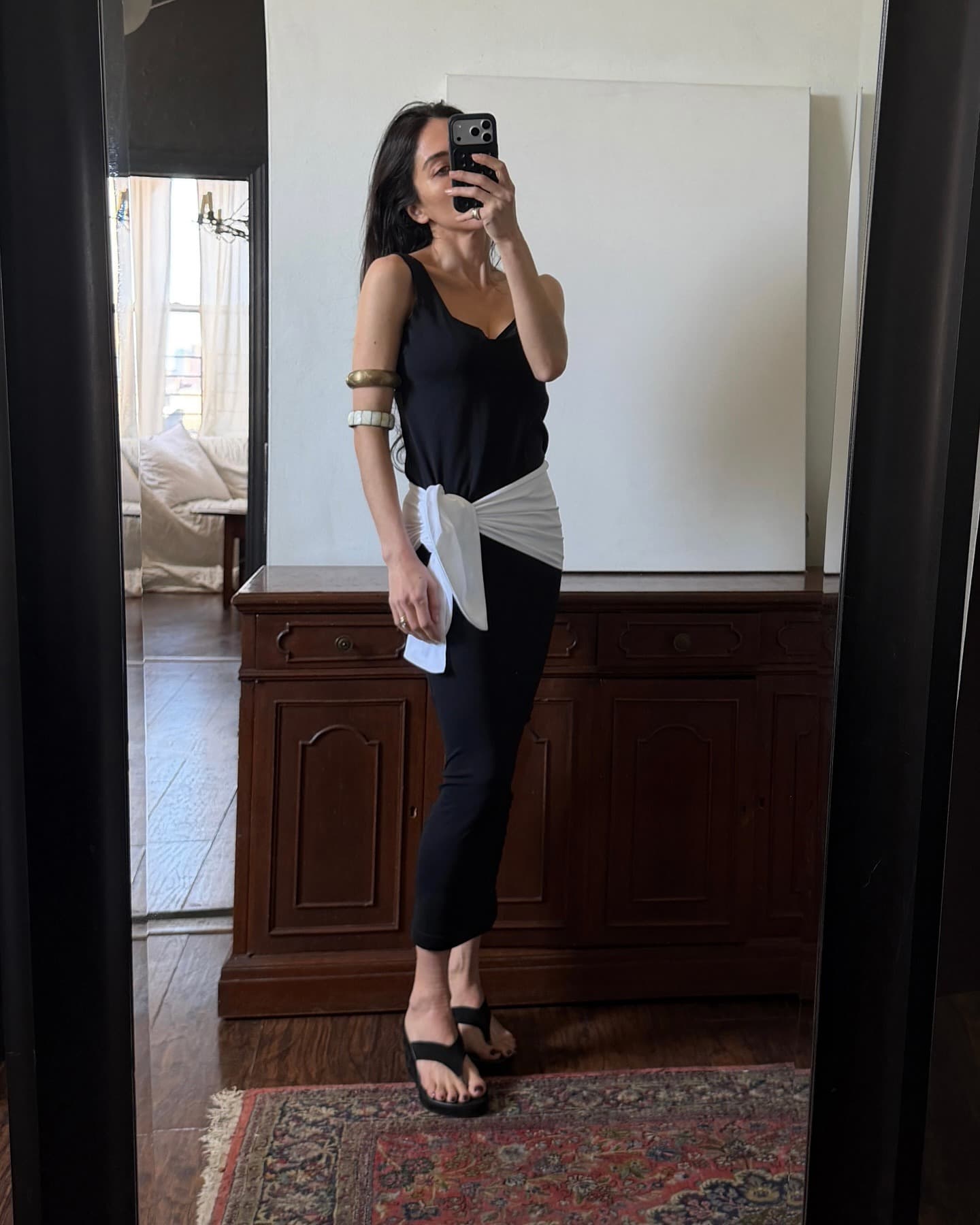 How to wear black in summer, with breathable fabrics and airy layers
