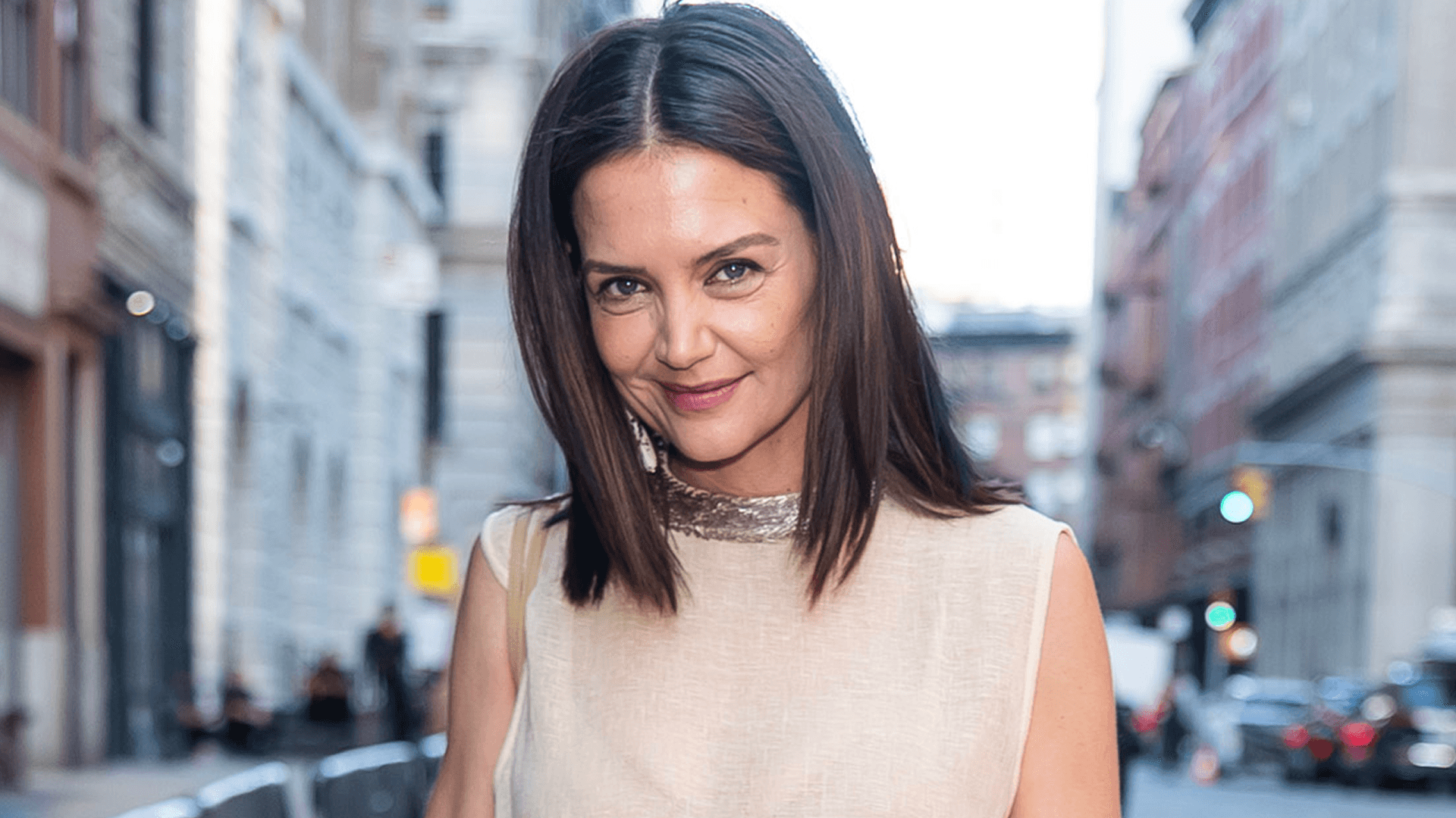 Katie Holmes elevates a linen tank with Chanel tailoring and accessories