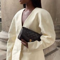 Why the unbuckled handbag is summer’s new status symbol