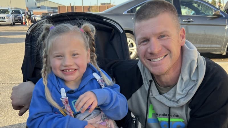 Fergus Falls girl walks Fargo Marathon finish line with her father