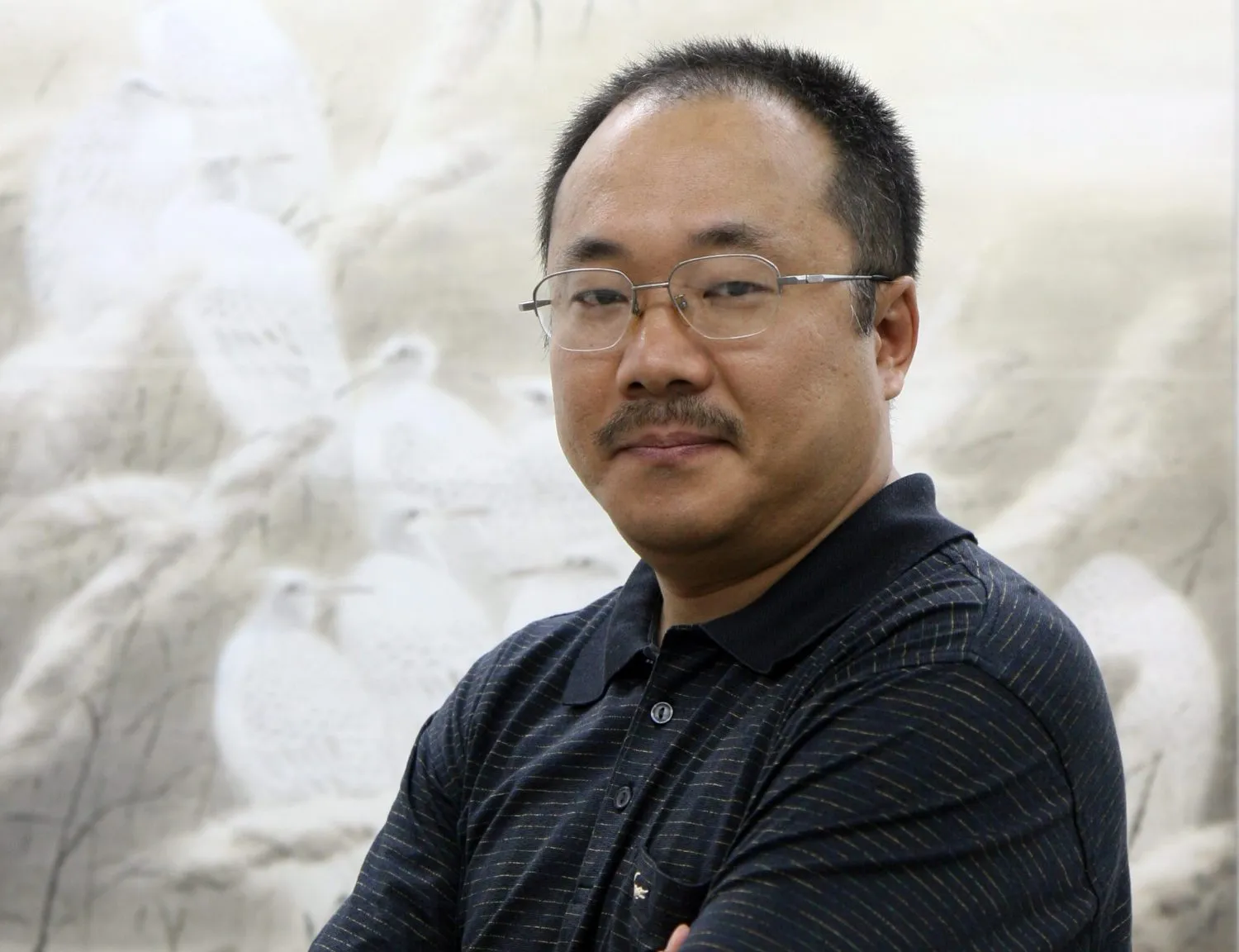 Family says Beijing prison dispute delays cancer care for jailed journalist