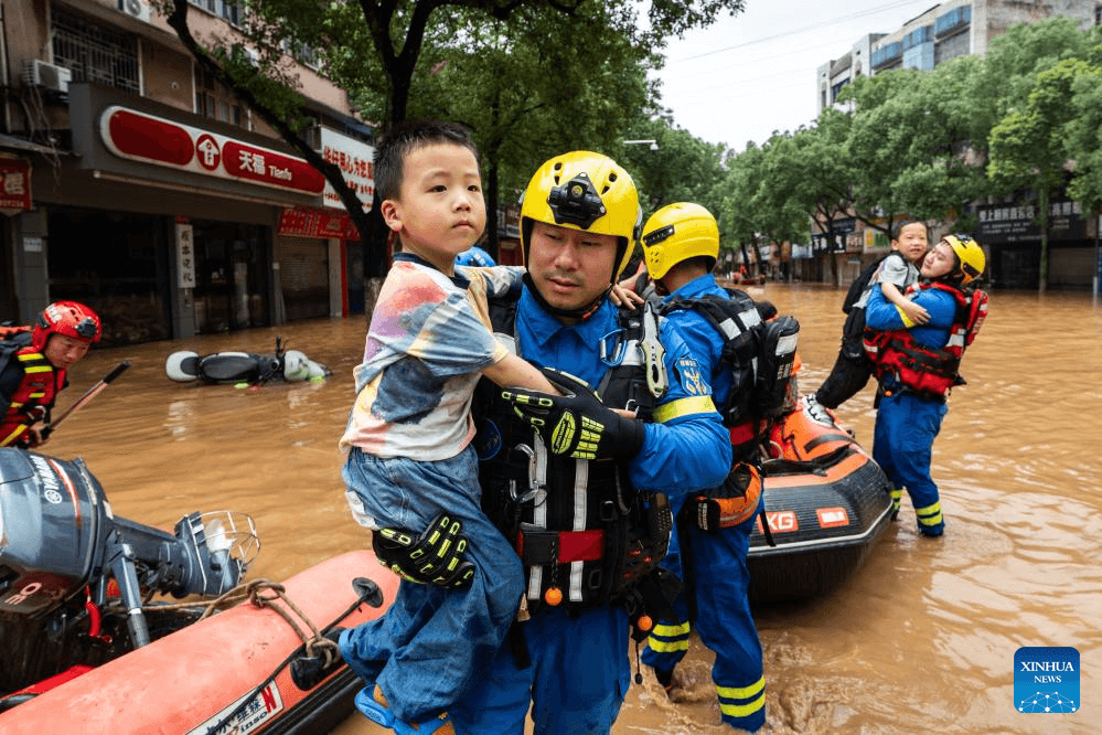 China floods kill 22, force evacuations across seven provinces