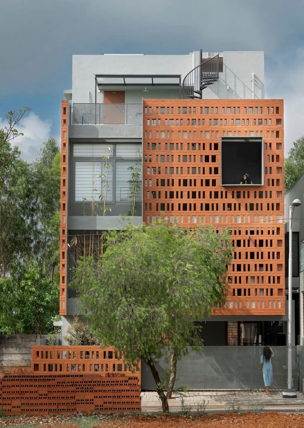 Bengaluru tiny house uses perforated brick facade and garden cooling