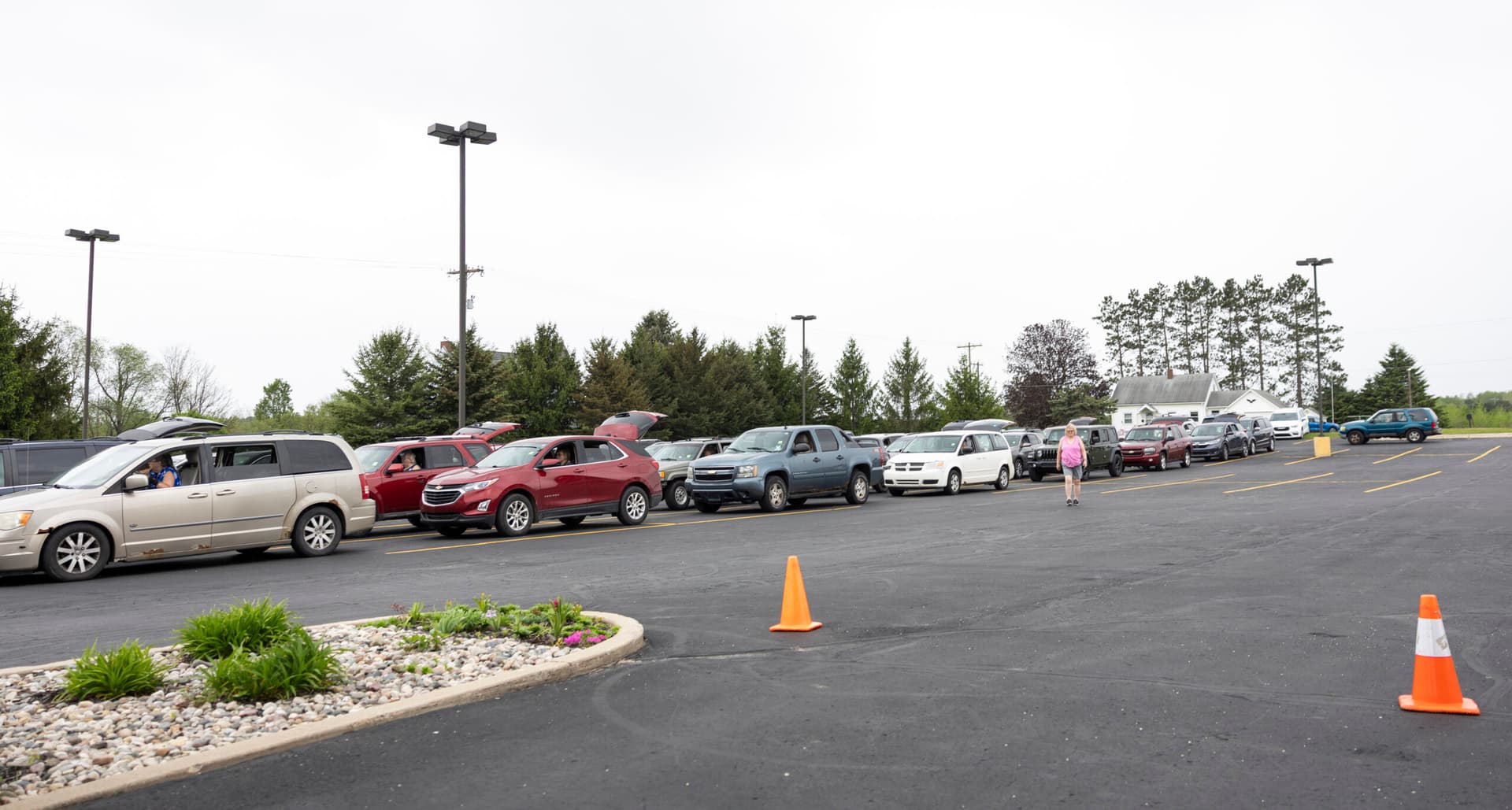 Drive-through food distributions prove efficient and popular, even after Covid