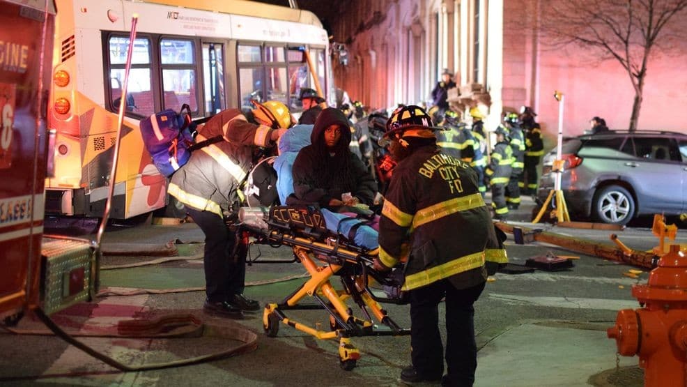 MTA Bus Crushes Car in Baltimore, Trapping Victim in Complex Rescue