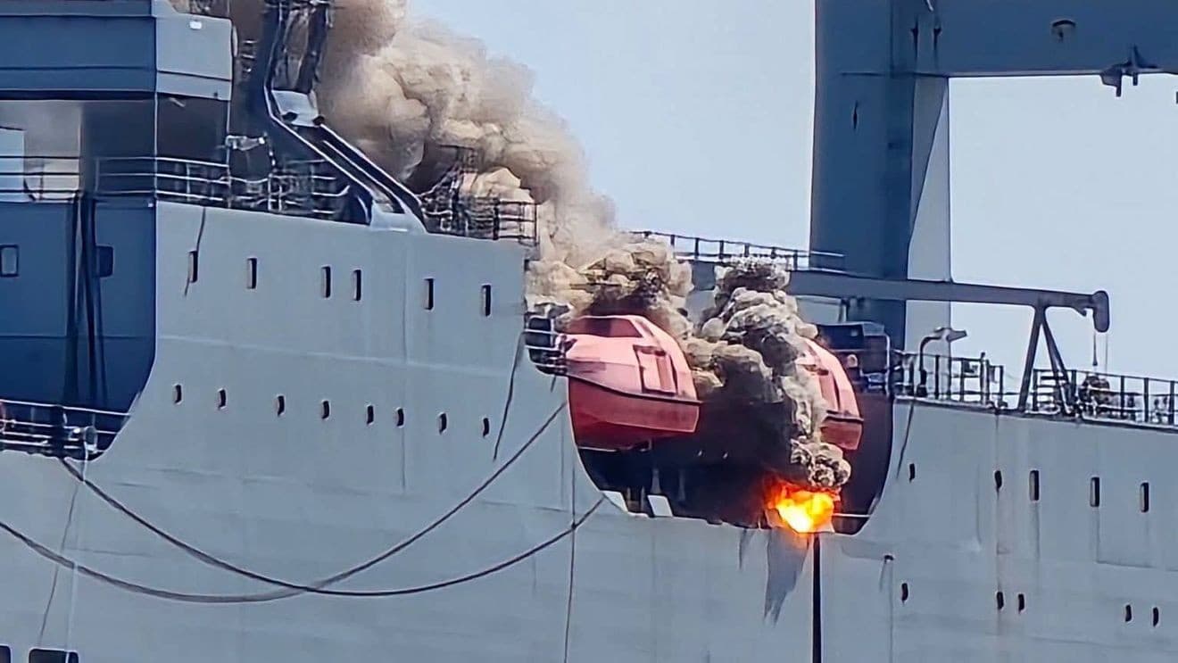 Baltimore firefighters battle lifeboat fire aboard ship in Patapsco River
