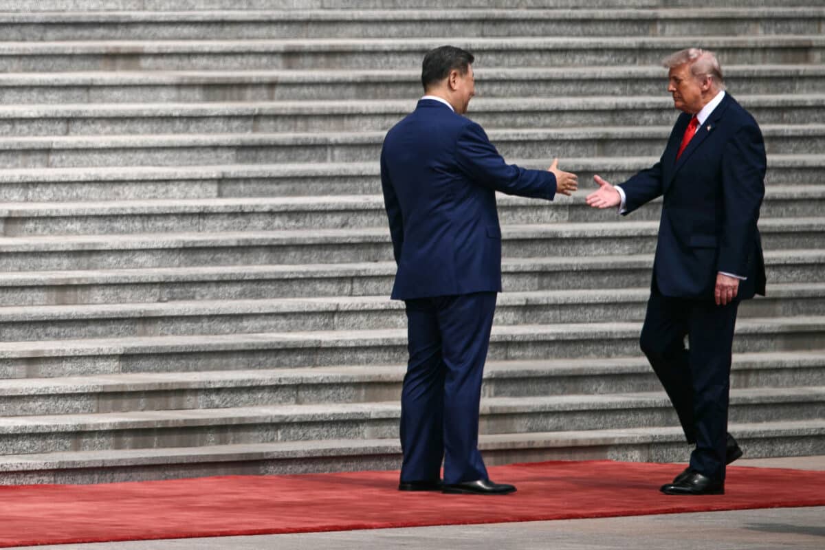 Trump and Xi project warmth amid deep tensions in Beijing summit