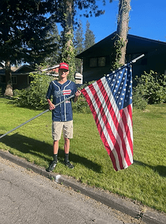 Coeur d'Alene youth teams help Kiwanis line streets with flags
