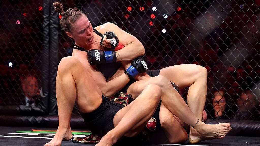 Ronda Rousey submits Gina Carano in 15 seconds, wins comeback bout