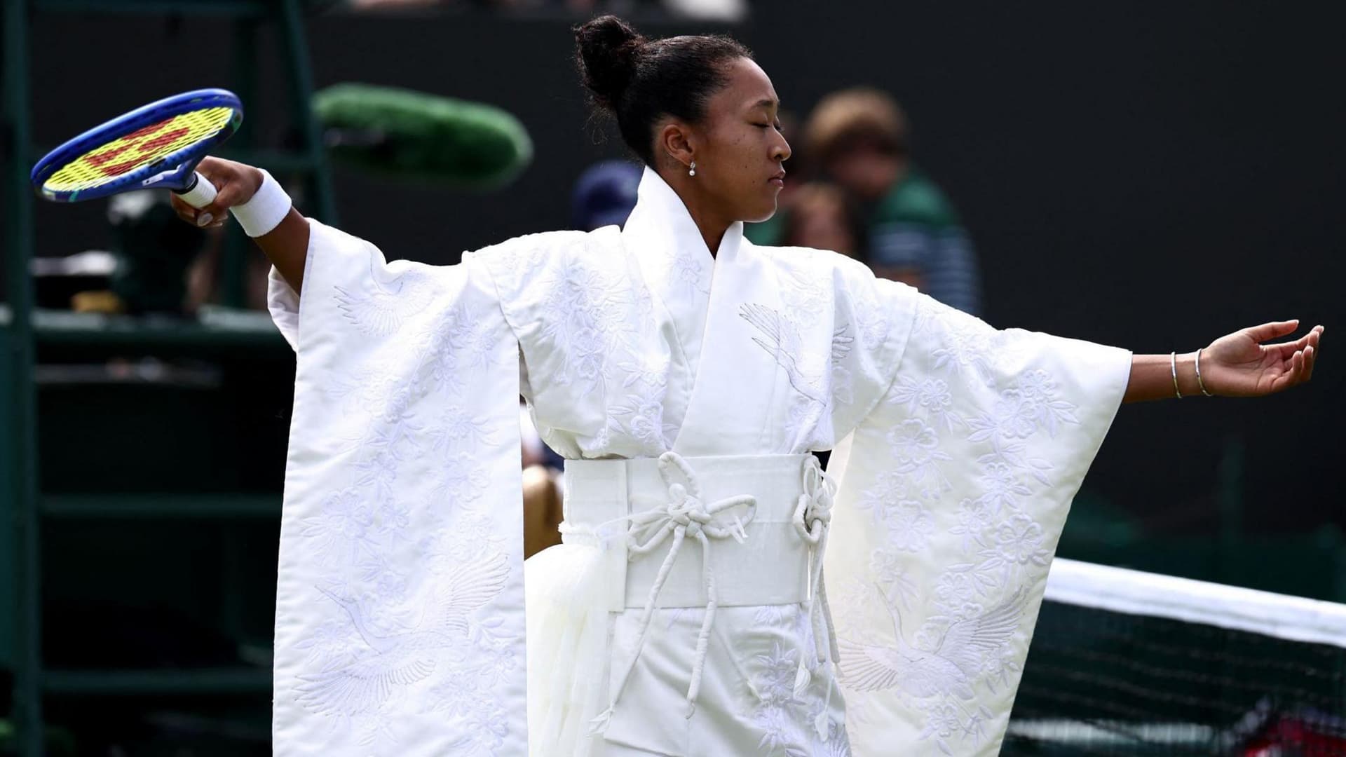 Naomi Osaka wears kimono-inspired white outfit at Wimbledon, advances