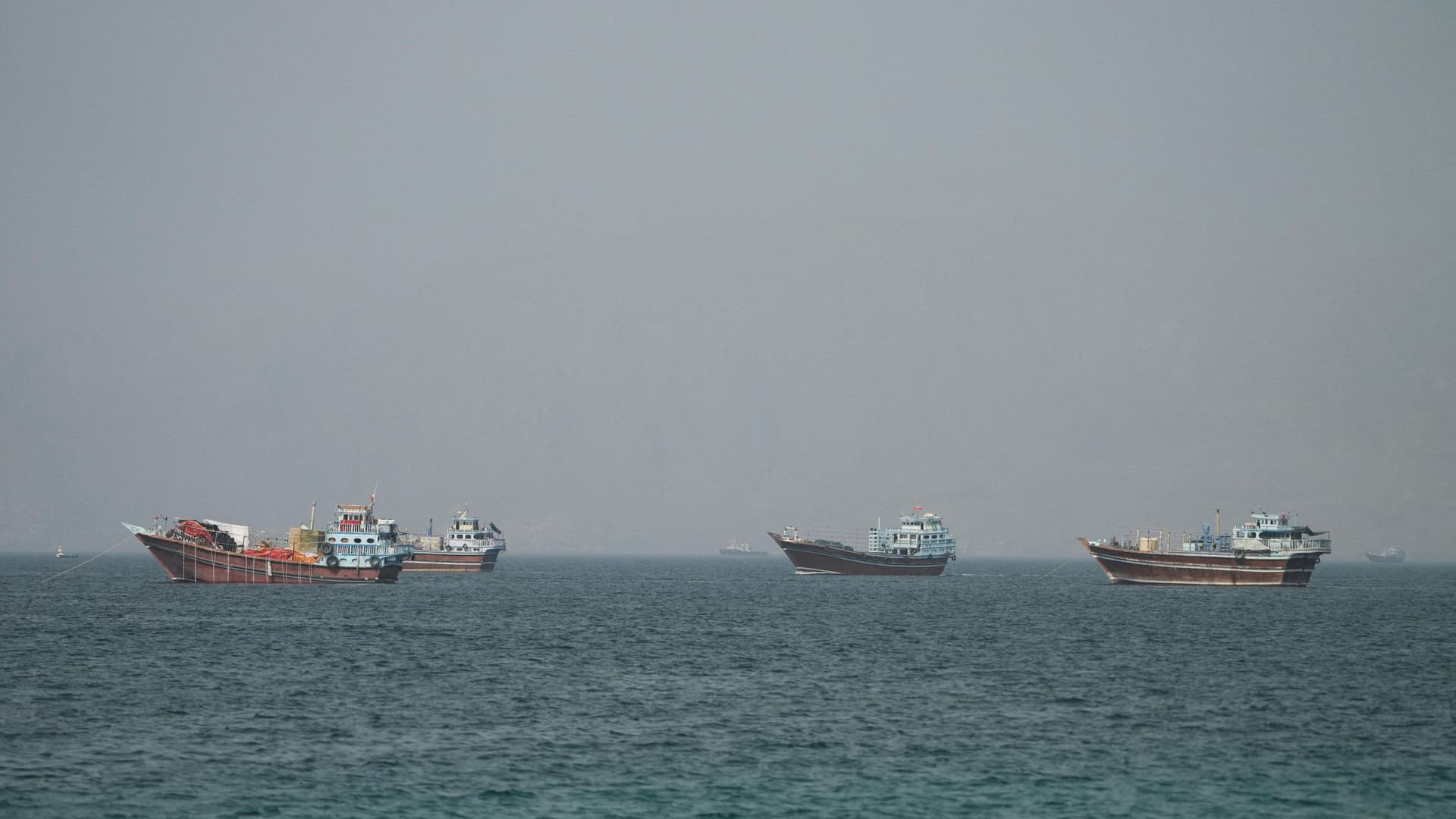 Unknown projectile hits cargo ship near Oman, prompting Hormuz evacuation pause