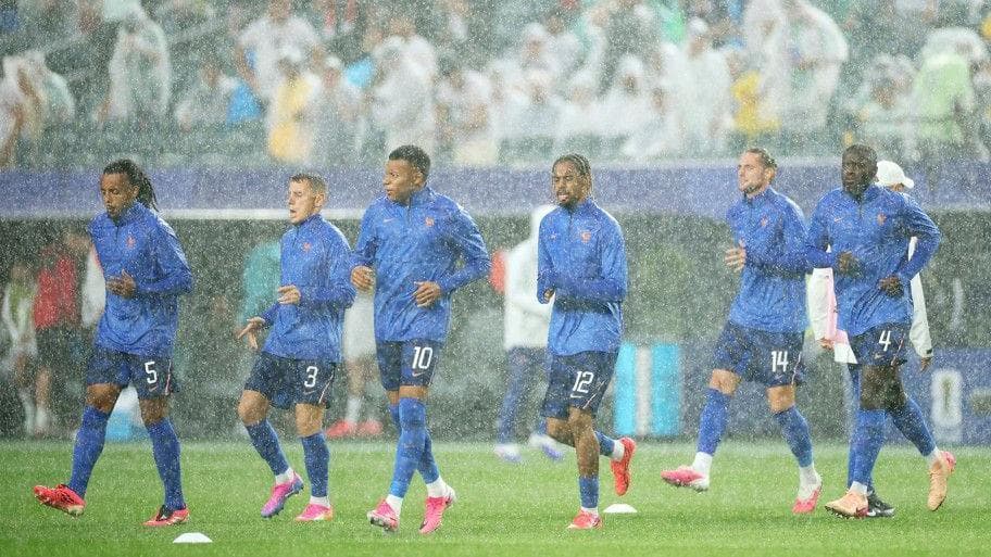 France beat Iraq after World Cup match delayed by stormy weather