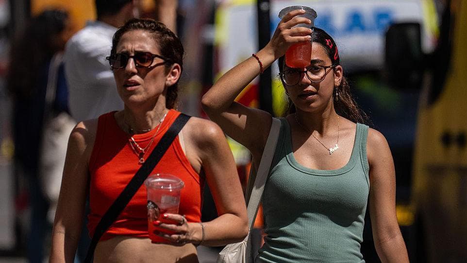 UK hits hottest June day on record as heat warning continues