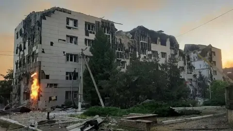 18 killed in strike on Russian-occupied Ukrainian town, officials say