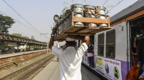 Mumbai’s dabbawalas face decline as remote work cuts demand