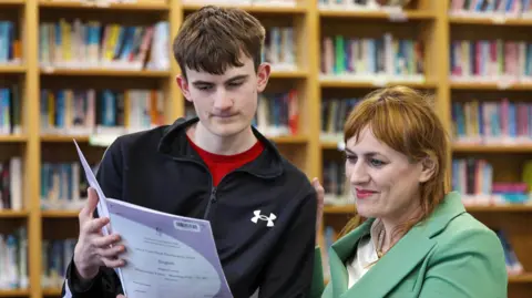 Irish poet’s son spots her own poem on exam paper