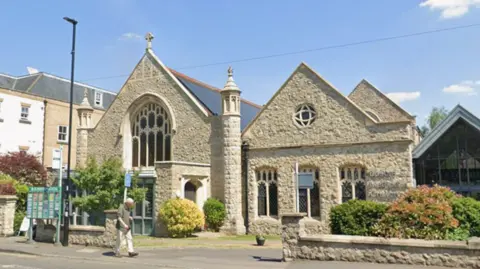 Police hunt suspects after woman raped outside Epsom church