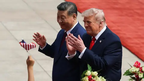 Trump lands in Beijing for high-stakes talks with Xi on trade, Taiwan
