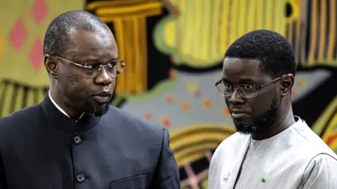 Senegal’s president dismisses prime minister, dissolves government amid debt crisis