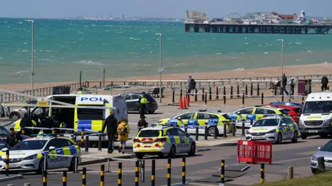 Brighton beach reopens after three women found dead in sea