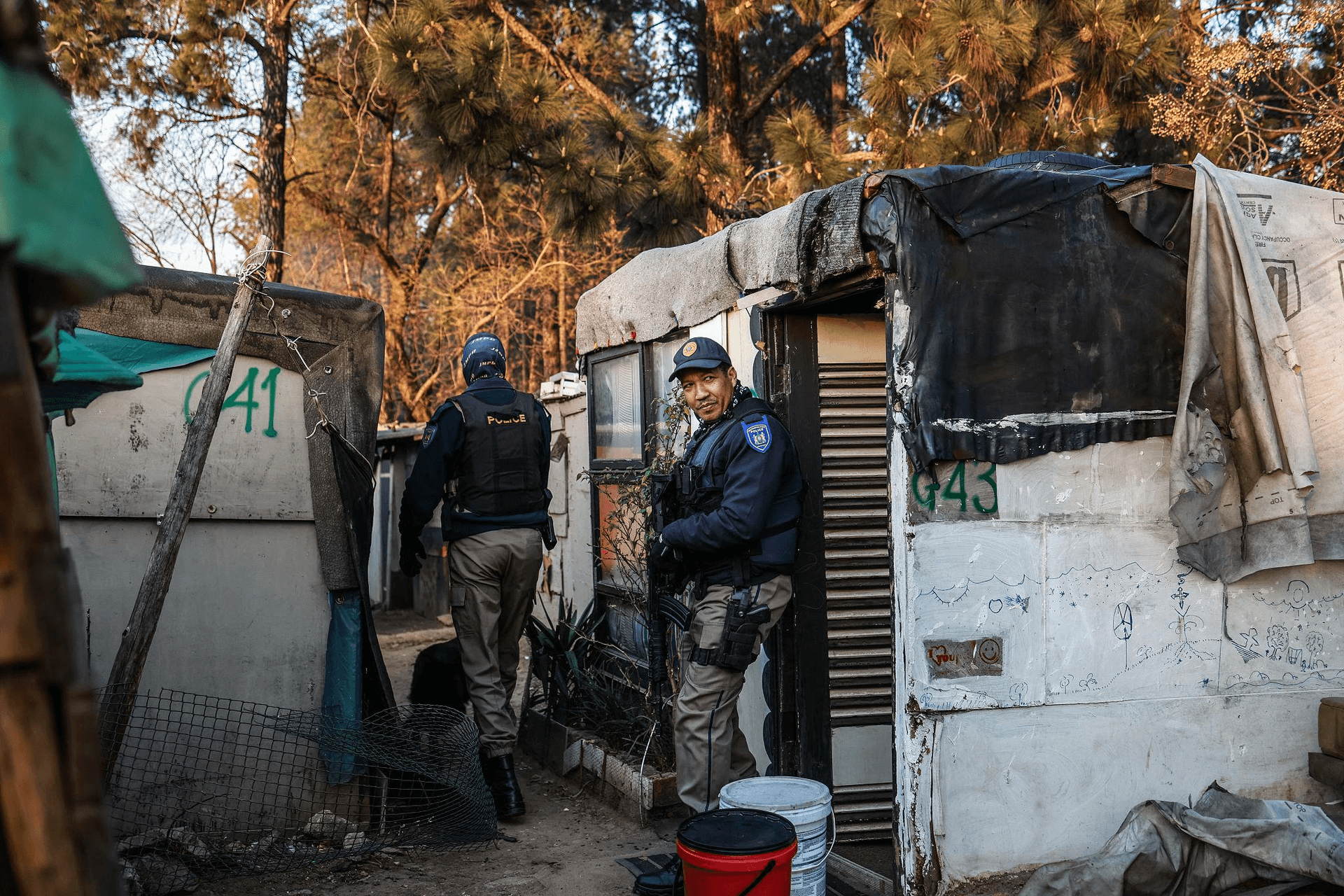 Police hunt suspects after 12 killed in Johannesburg settlement shooting